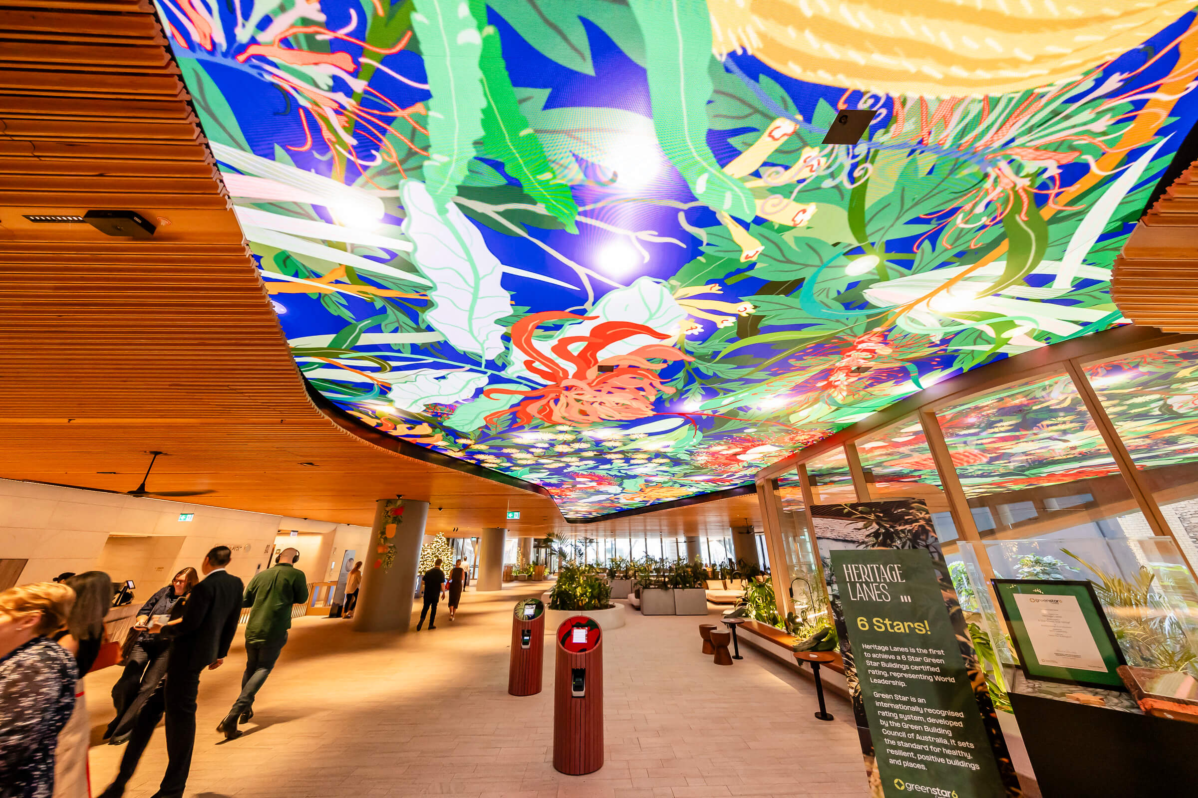Christmas digital art display created by VANDAL for Heritage Lanes featuring animated Australian florals