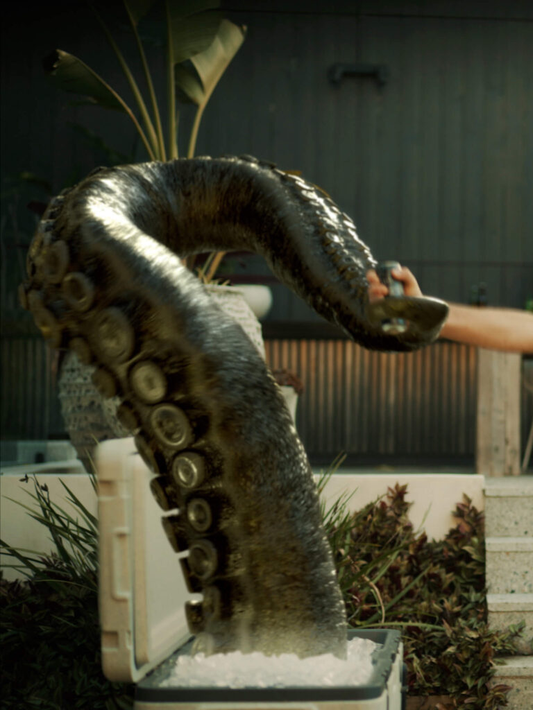 Still from Kraken Black Mojito TVC featuring a tentacle clutching a can of the drink - VFX animation by VANDAL 
